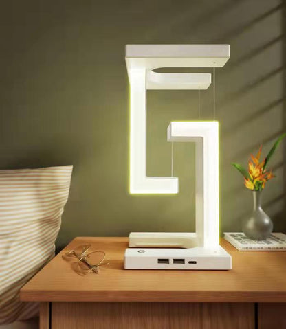 Lampe suspendue créative à recharge sans fil pour smartphone avec un design innovant